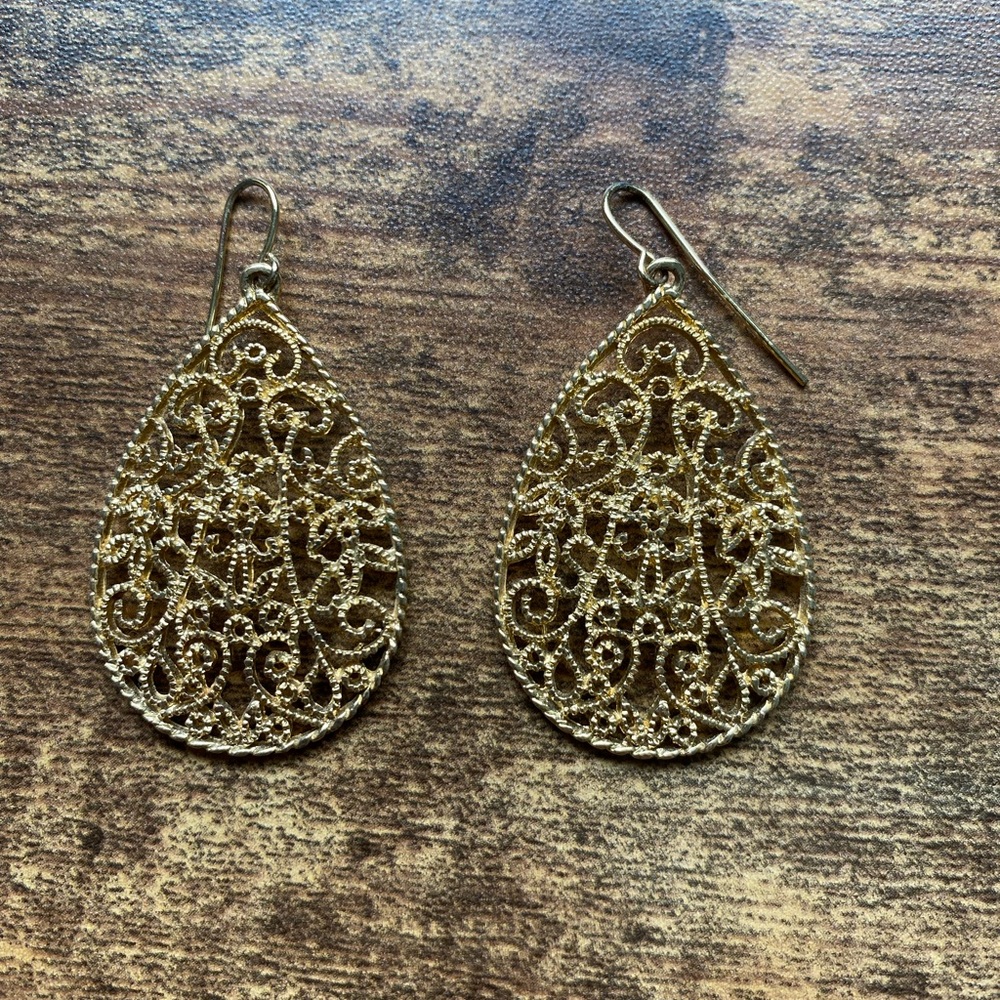 Gold colored detailed teardrop earrings